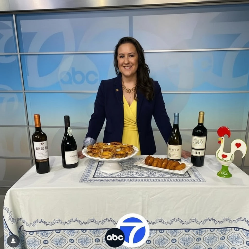 Load video: News feature video of Diniz Cellars during Portuguese Wine Week highlighting sustainable Portuguese wineries.